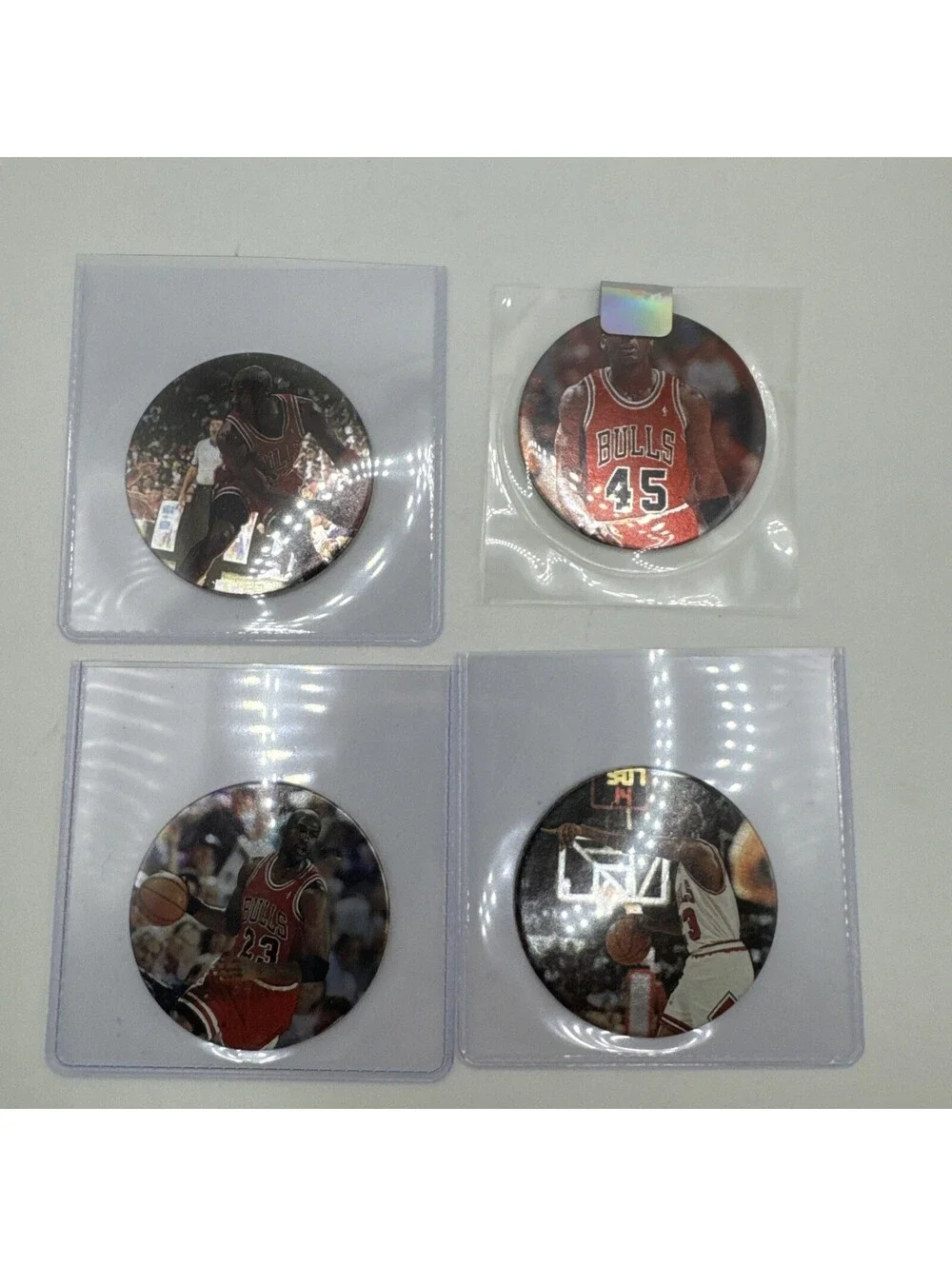 (4) 1995 Upper Deck Milk Cap Michael Jordan S #8, 24, 26, & 45 - In Protectors